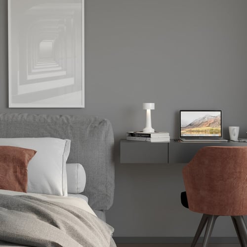 ابجورة شحن لاسلكي باللون الأبيض