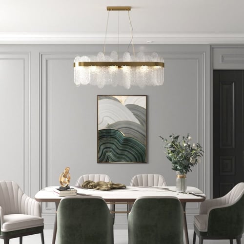 ثريا مودرن ذهبية وسط بزجاج بيضاوي