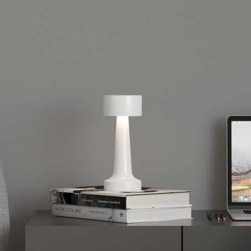 ابجورة شحن لاسلكي باللون الأبيض