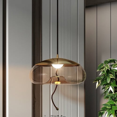 إضاءة معلقة بيضاوي زجاج عسلي