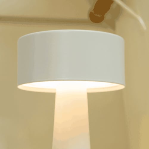 ابجورة شحن لاسلكي باللون الأبيض