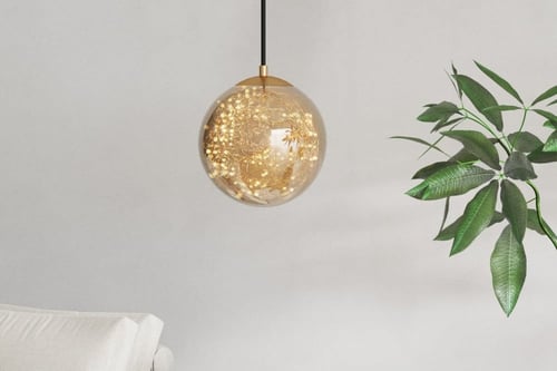 إنارة معلقة ليد ذهبية زجاج عسلى