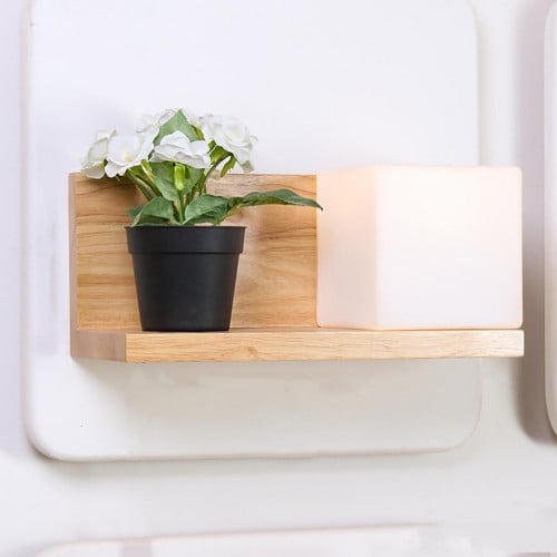 ابجورة جدارية مربع مضيء على رف خشبي