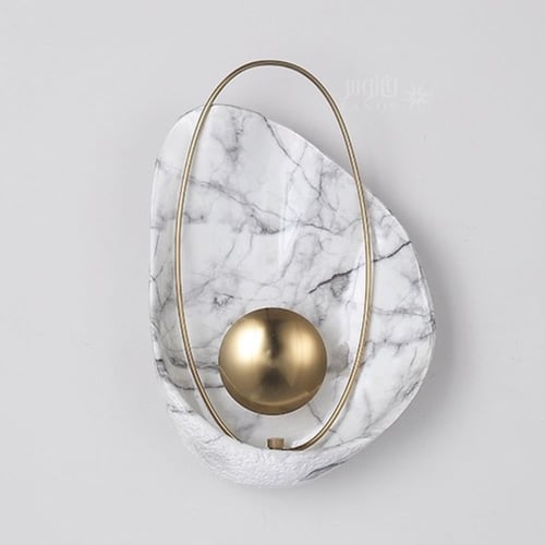 أبليك حائط مودرن أبيض اكليريك رخامي مع كرة ذهبية