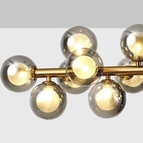 ثريا ذهبية مودرن طولية بزجاج رمادي شفاف