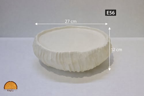 طبق تقديم دائري بحافة متموجة