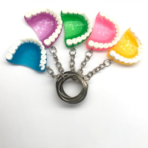 ميدالية طقم اسنان