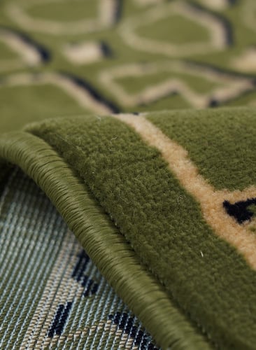 سجادة صلاة بتصميم باب الحرم النبوي