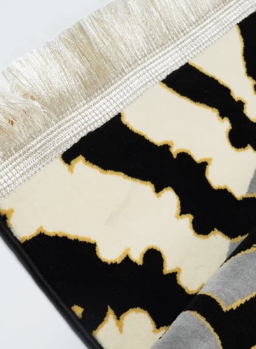 سجادة صلاة مستوحاه من من قبب الحرم النبوي