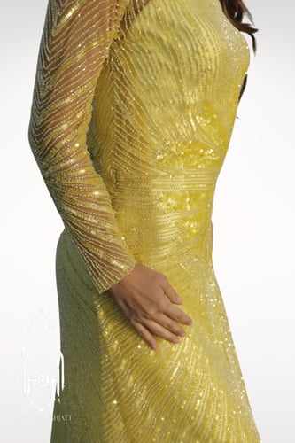 فستان اصفر مطرز ومشكوك يدويا بخرز انيق برسمة غير م...