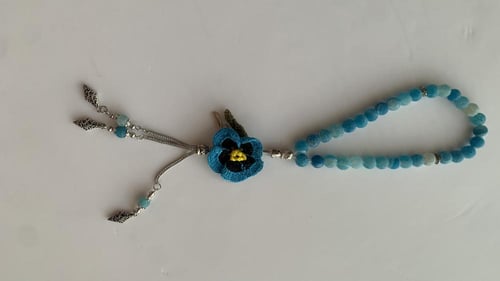 سبحة 33 عقيق برازيلي أزرق فيروزي مزينة بوردة أويا...