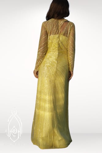 فستان اصفر مطرز ومشكوك يدويا بخرز انيق برسمة غير م...