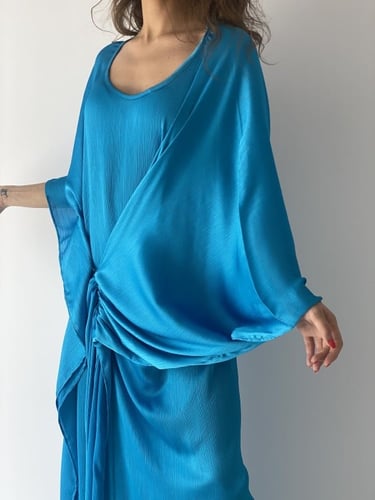 فستان حرير فيروزي درابيه فري سايز يلبس بعدة طرق