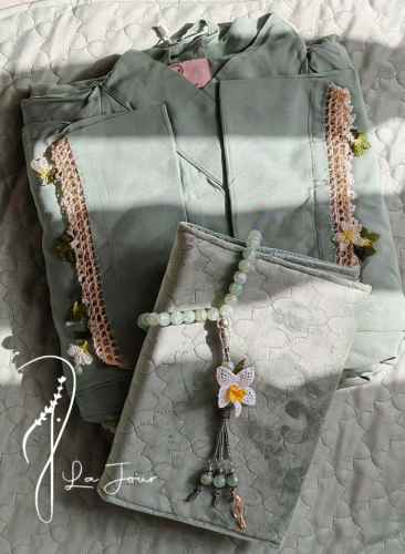 شرشف صلاة لف أخضر فاتح بالورد الاويا.