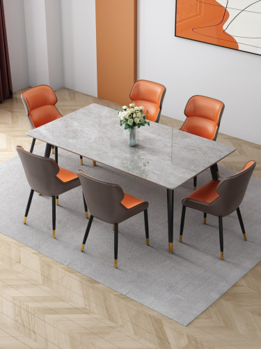 طاولة طعام سطح رمادي مع كراسي برتقالي