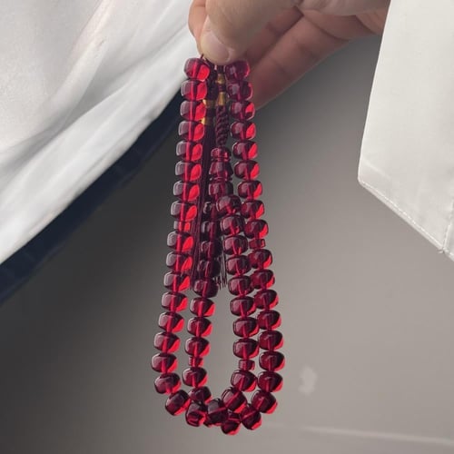 مسباح زعفراني احمر شفاف