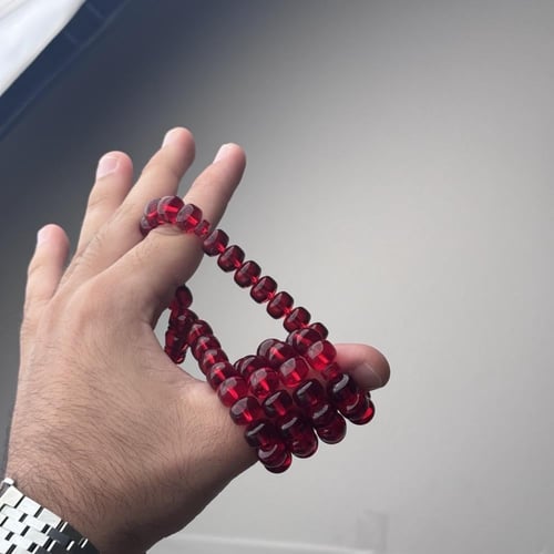 مسباح زعفراني احمر شفاف