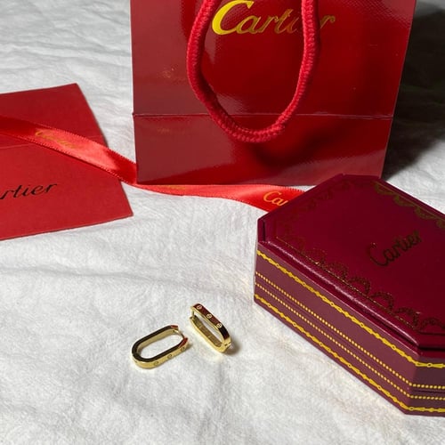 حلق كارتير ذهبي