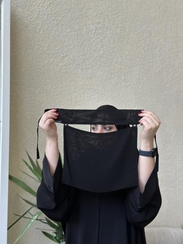 نقاب مغاطين