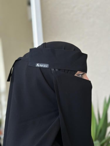 نقاب مغاطين