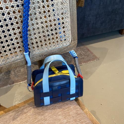 blue bag with strap | الحقيبة الزرقاء مع الستراب