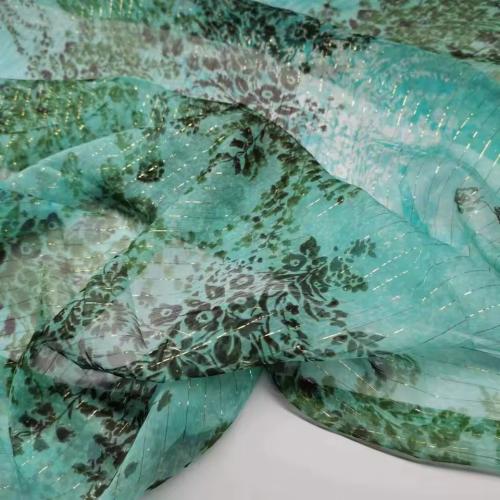 ملحفة سوار حرير فاخرة – نقشة فنية بلون الفيروز ولم...