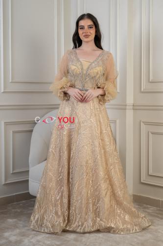 فستان سهرة ذهبي راقٍ بأكمام شفافة وتطريز ملكي - تص...