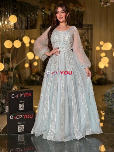 فستان سهرة سماوي فاتح مطرّز بخطوط عمودية بقصّة A-L...