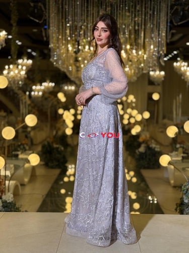 فستان سهرة ليلكي فاتح مطرز بالدانتيل والخرز مع أكم...