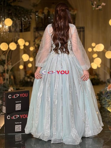 فستان سهرة سماوي فاتح مطرّز بخطوط عمودية بقصّة A-L...