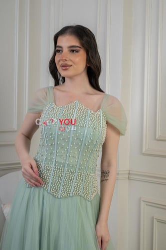 فستان سهرة أخضر فاتح بتطريز فاخر وتنورة تول أناقة...