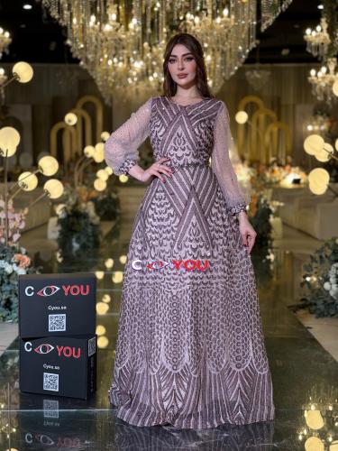 فستان سهرة تألقي بفخامة لافتة مع هذا الفستان الموف...