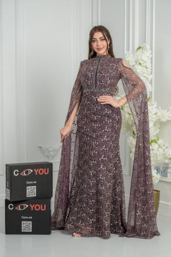 Luxurious nude mermaid evening gown with a regal cape