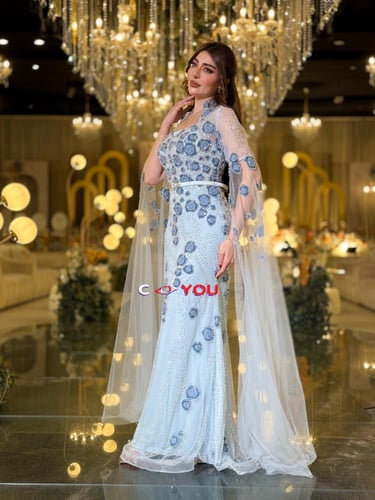 فستان سهرة تيفاني بتطريز أزرق لامع يمنحك حضوراً را...
