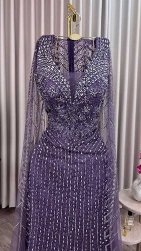 فستان سهرة بنفسجي، مطرز ببريق ناعم يعكس الفخامة،أك...