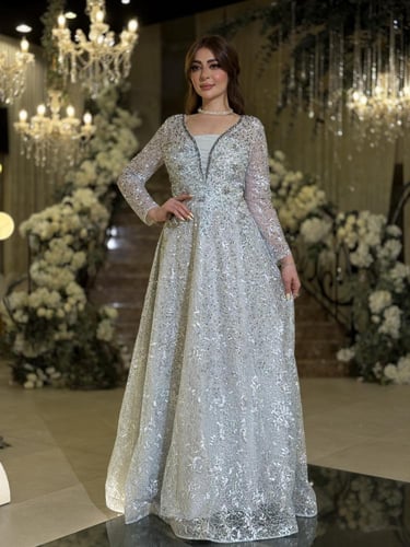 فستان سهرة فاخر سماوي براق بأكمام طويلة يضفي لمسة...
