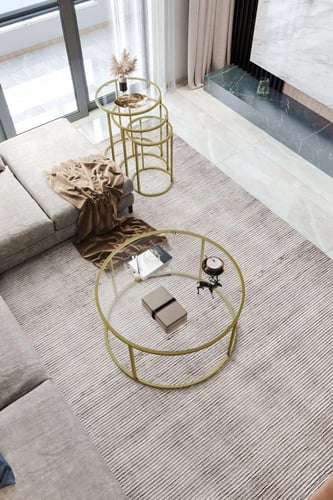 طاولة ضيافة حديد ذهب سطح زجاج شفاف