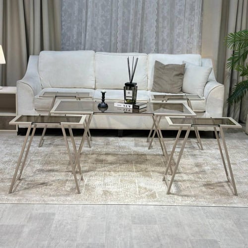 طقم طاولات شمباني أنيق بسطح زجاجي بني شفاف ولمسات...