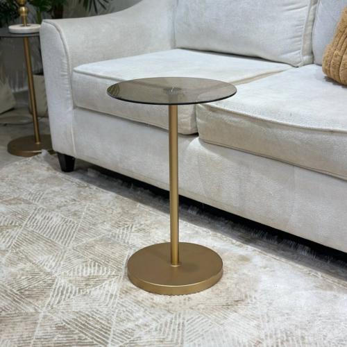 طاولة خدمة حديد ذهبي سطح زجاج بني شفاف - أنيقة وعص...