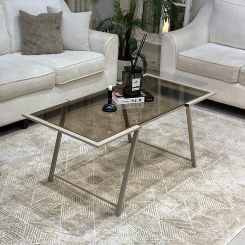 طقم طاولات شمباني أنيق بسطح زجاجي بني شفاف ولمسات...