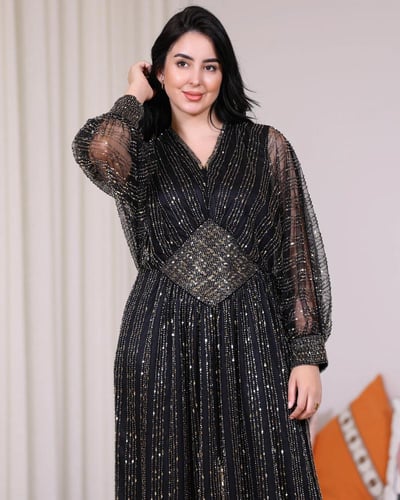 فستان ترتر فاخر أسود بقصة خصر أنيقة | سيدتي