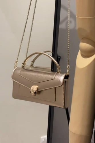 شنطة بولغاري ذهبي