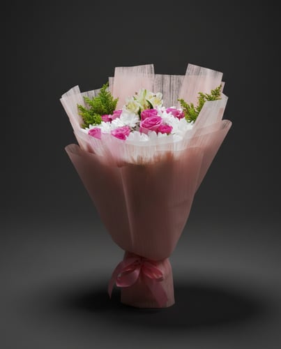 A mixed bouquet of pink roses and white carnations
