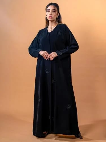 A French-style abaya with soft fabric and a circul...