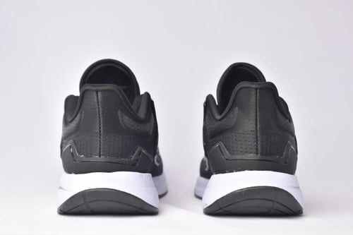 اديداس باونس اسود an Adidas EQ21 Run running shoe...