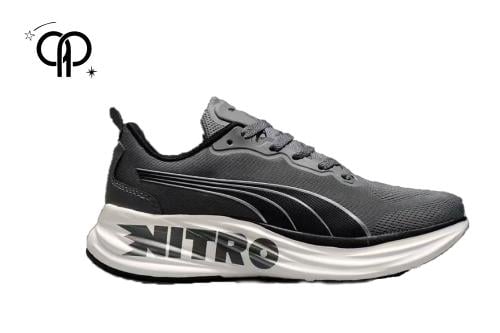حذاء رجالي بوما رمادي داكن pair of grey Puma Nitro...