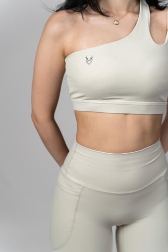 طقم رياضي نسائي بكتف واحد (بيج)