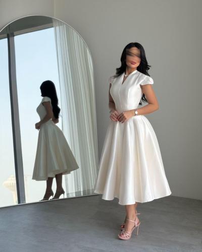 فستان ميدي ابيضّ