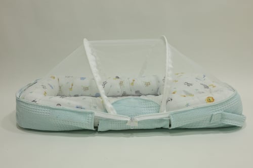 شنطة مواليد تتحول الي مفرشم معا ناموسية