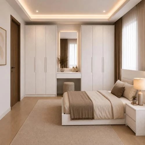 Modern bedroom with a wall of closets and a dressi...